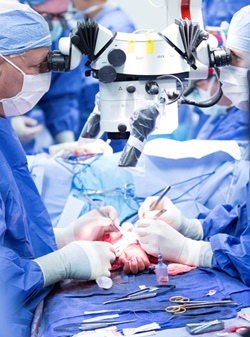 Dr. Levin doing hand surgery
